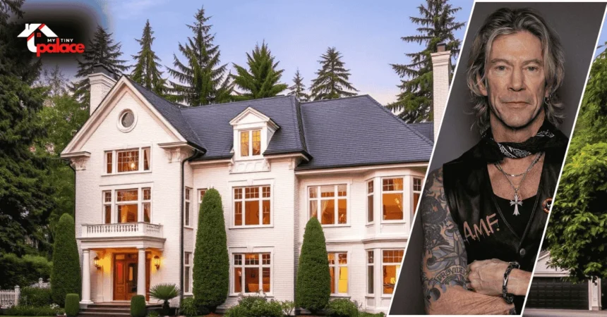 Image showing the Duff McKagan House with the house in the background and a framed portrait of Duff McKagan at the front.