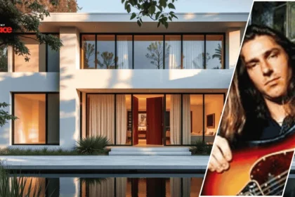 A welcoming Georgia-style home in the background with a framed portrait of Ed Roland placed at the front of the scene.