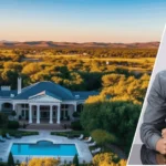 Image showing the Joel Osteen Houses with one of the estates in the background and a framed portrait of Joel Osteen at the front.