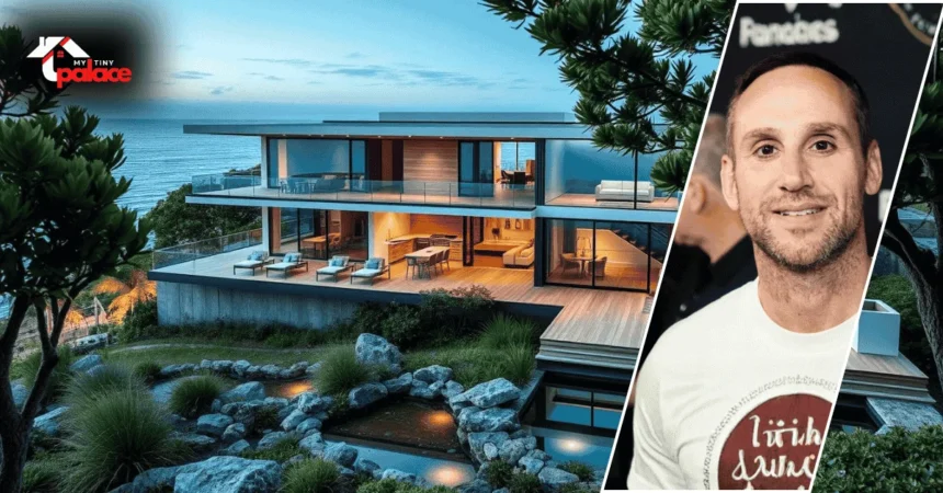 Image showing the Michael Rubin Hamptons house with the modern beachfront home in the background and a framed portrait of Michael Rubin at the front.