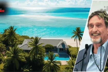 Image showing the john mcafee belize house with the tropical-style home in the background and a framed portrait of John McAfee placed prominently in the foreground.