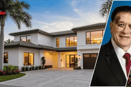 Image showing the kiran patel house in tampa with the residence in the background and a framed portrait of Kiran Patel displayed at the front