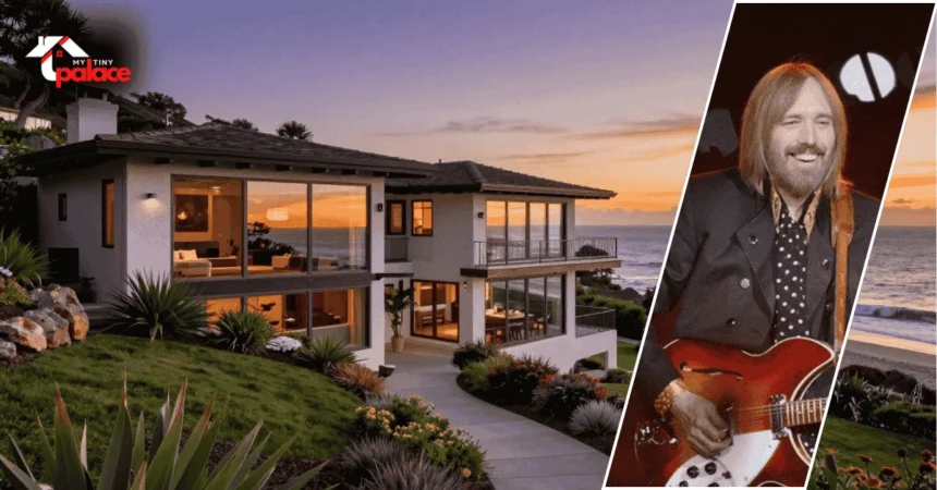 Image showing the tom petty malibu housefirm with the Malibu home in the background and a framed portrait of Tom Petty displayed at the front.