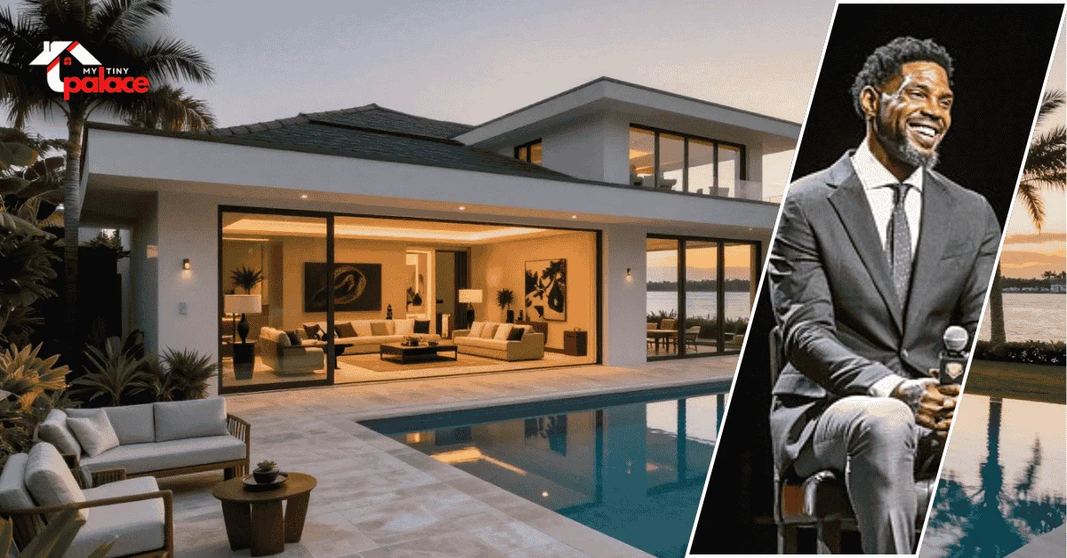 An outdoor view of the udonis haslem house featuring the large Mediterranean-style architecture in the background and a framed portrait of Udonis Haslem in the foreground.