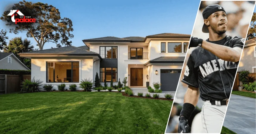 An image of the ken griffey jr house showcasing the sprawling luxury estate in the background with a framed portrait of Ken Griffey Jr positioned in the foreground.