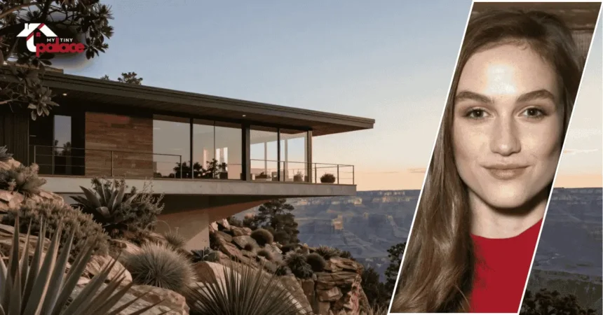 A photograph of the Bosch House LA featuring the glass-walled architectural structure in the background and a framed portrait of the owner placed in the front.